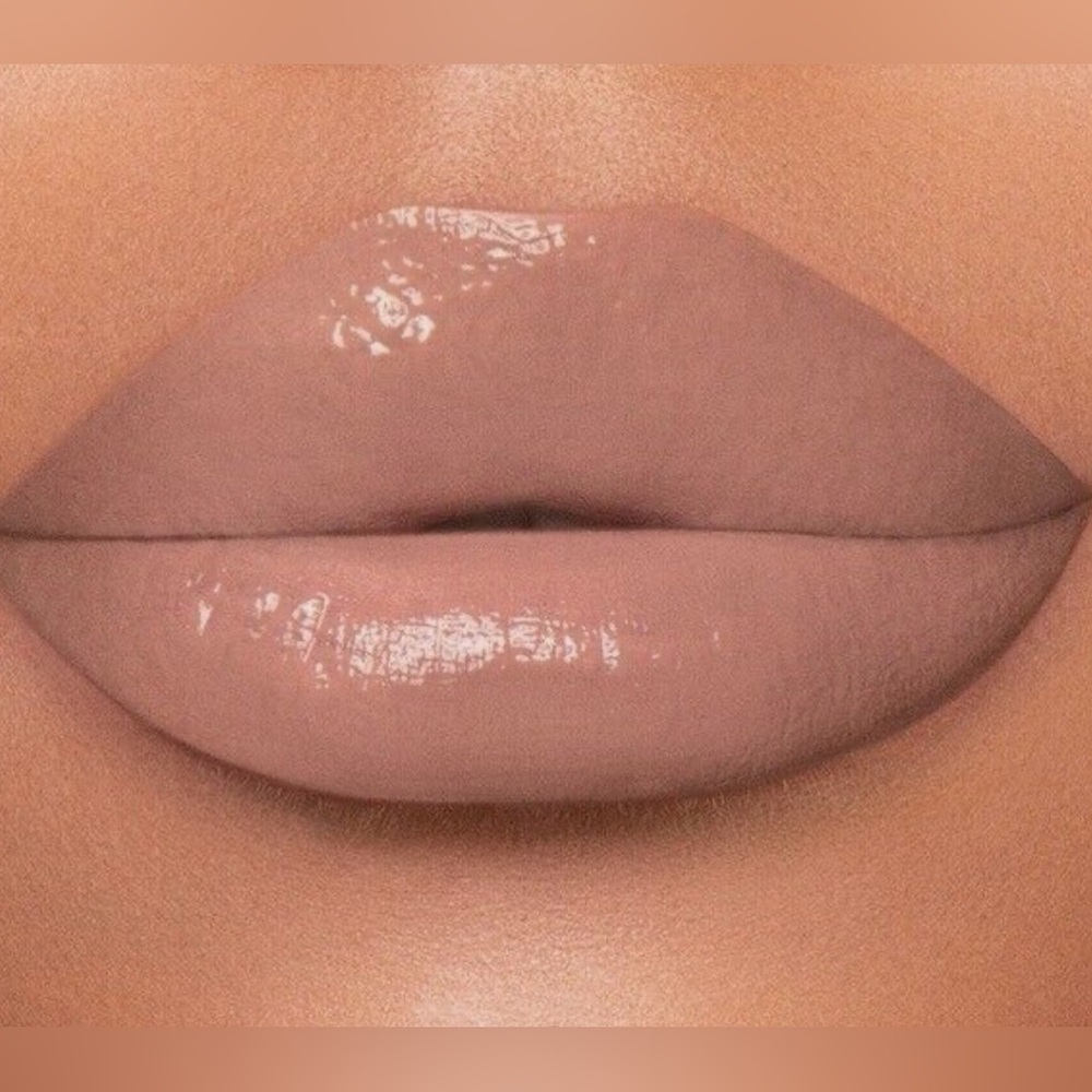 Jeffree Star Supreme Gloss in Naked in the Dark Shade -light nude with grey tone